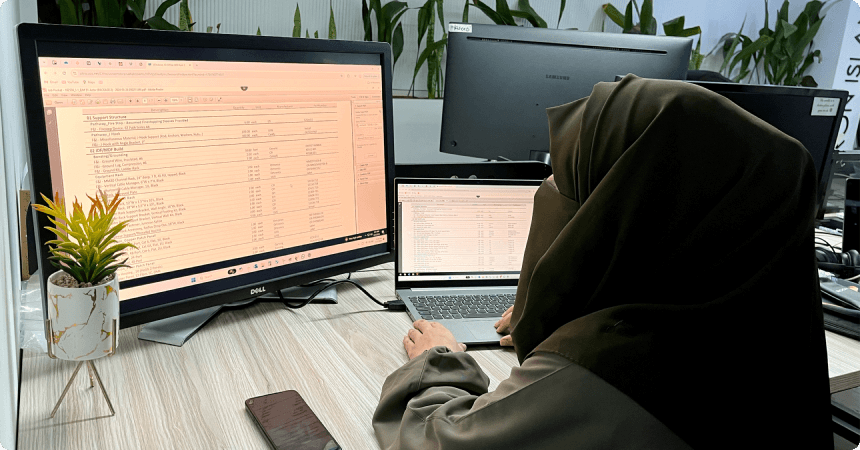 LantroTech employee working on project documentation