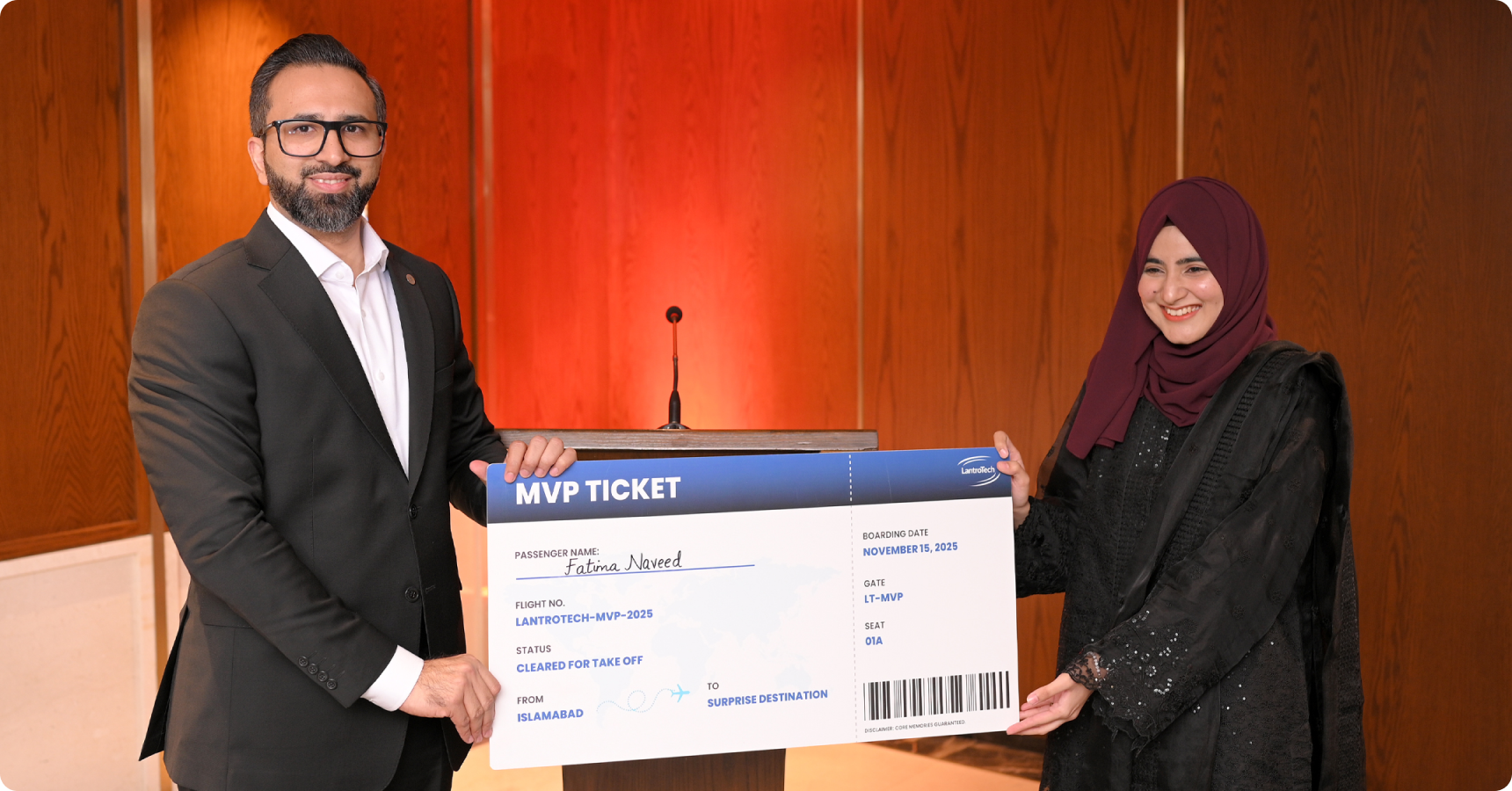 LantroTech CEO Waqas Khalil presenting the MVP Award to the top performing employee of the year.