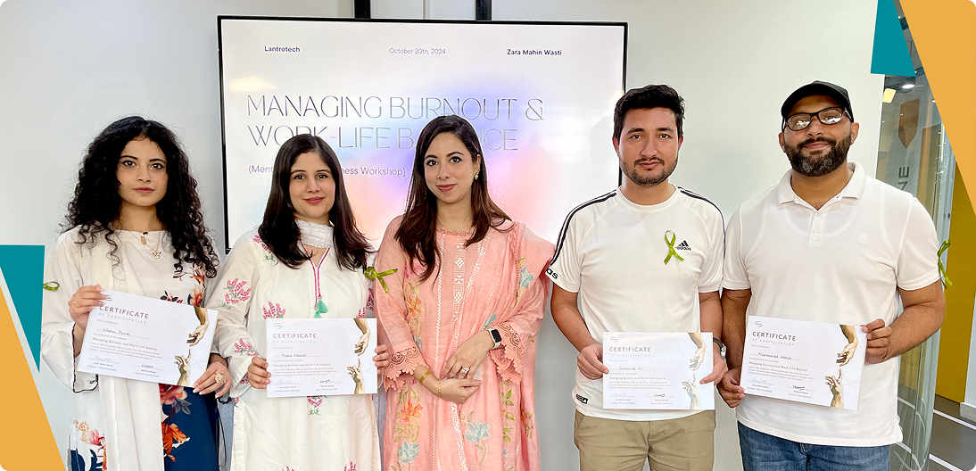 LantroTech team members holding certificates after a Mental Health Awareness workshop, showcasing the company's commitment to proactive mental health and employee wellness.